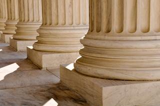 Close up of marble pillars outside of a courthouse